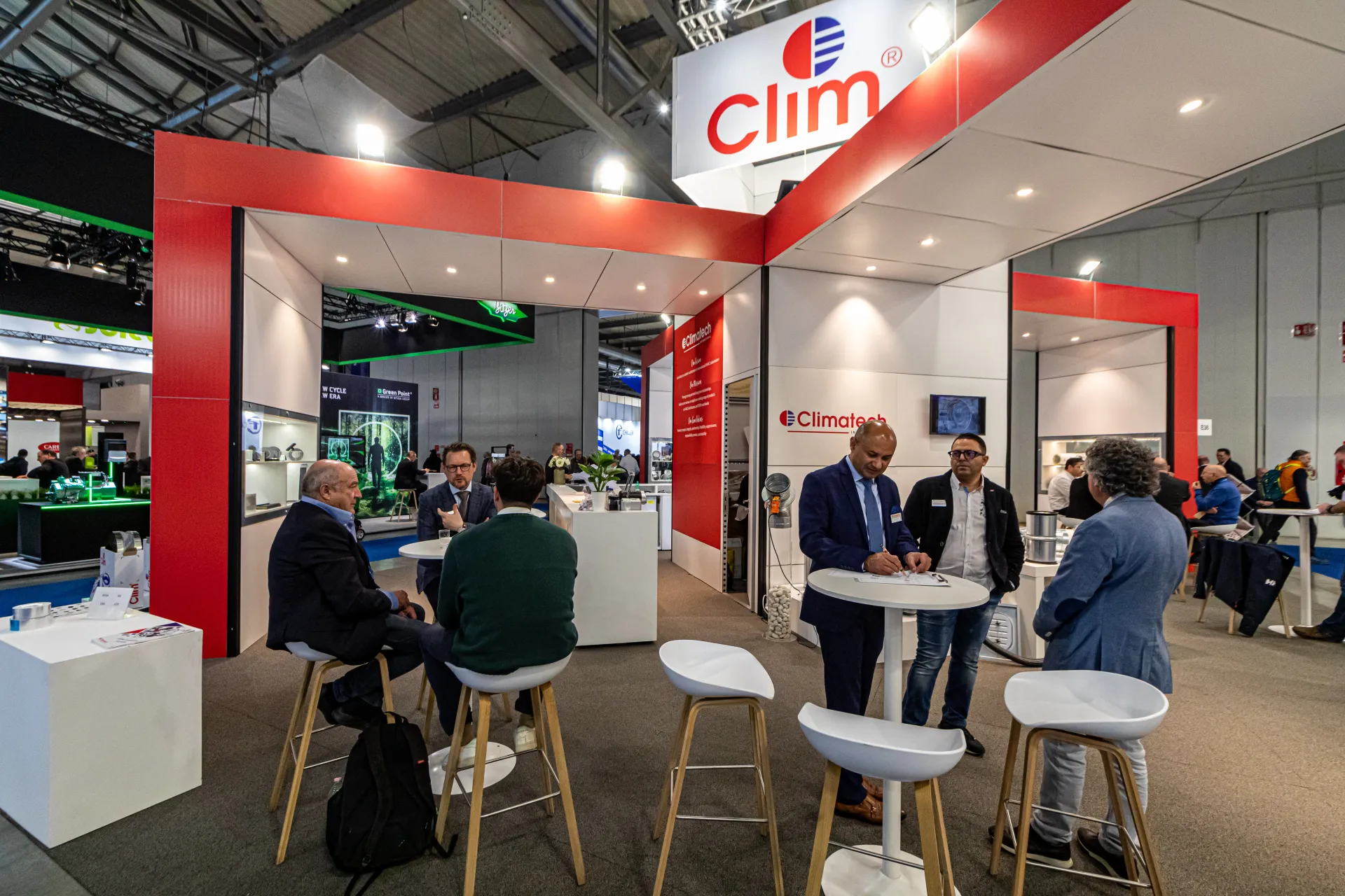 Meeting tables under the Clim sign at the Climatech stand at MCE 2024