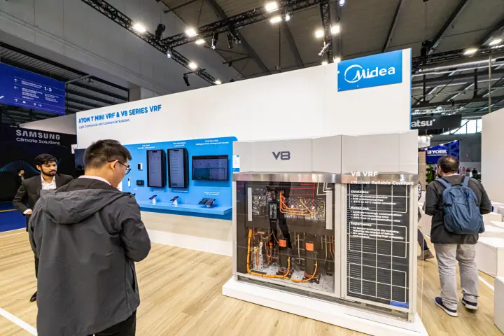 Midea V8 VRF outdoor unit with transparent front showing compressors at MCE 2024