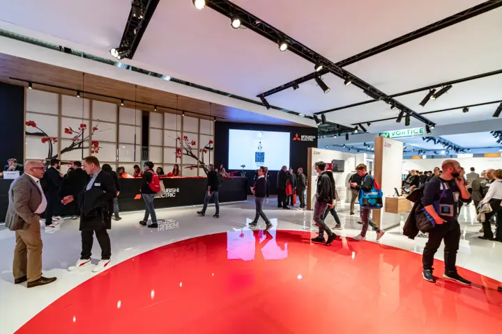 Mitsubishi Electric stand with red glossy floor and cherry blossom reception