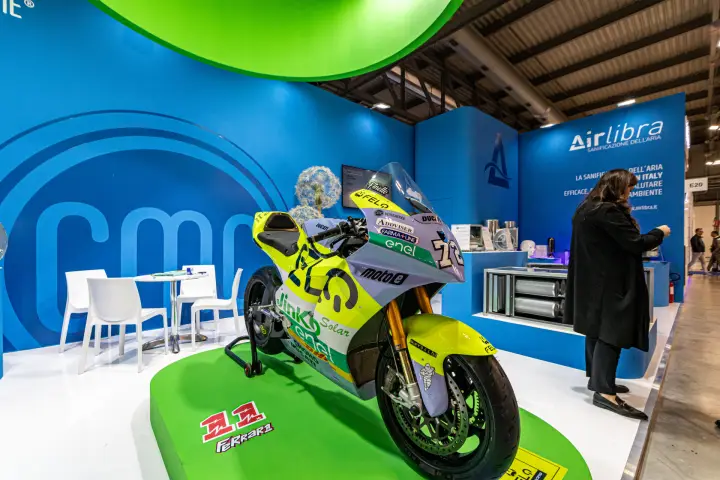 MotoE race bike on CMC Ventilazione stand beside Airlibra units