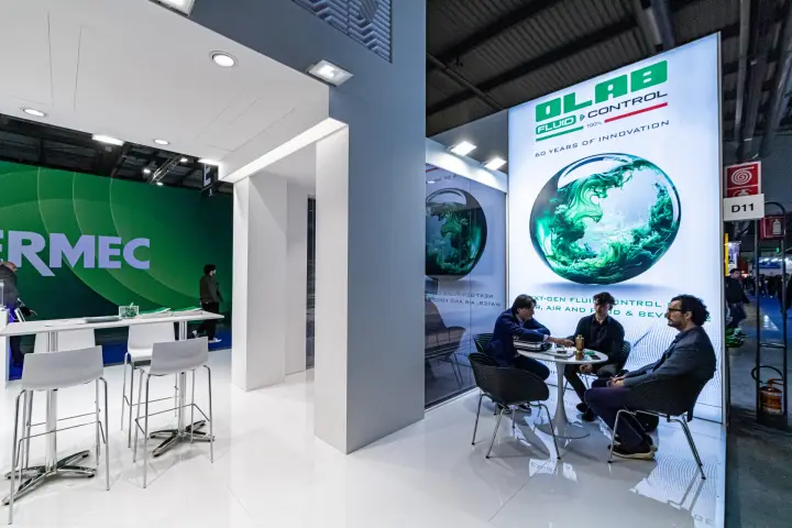 Olab meeting corner with backlit '60 YEARS OF INNOVATION' panel