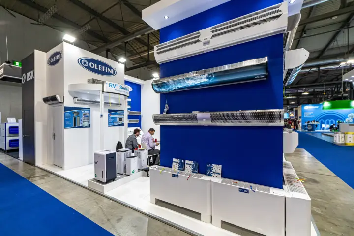 Olefini air curtains and fan coils on a blue display wall