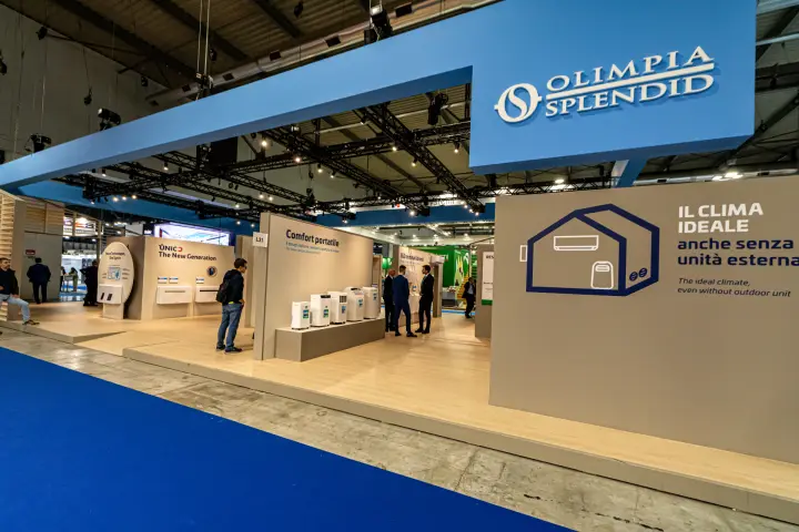 Olimpia Splendid stand with light blue canopy and beige display partitions at MCE 2024