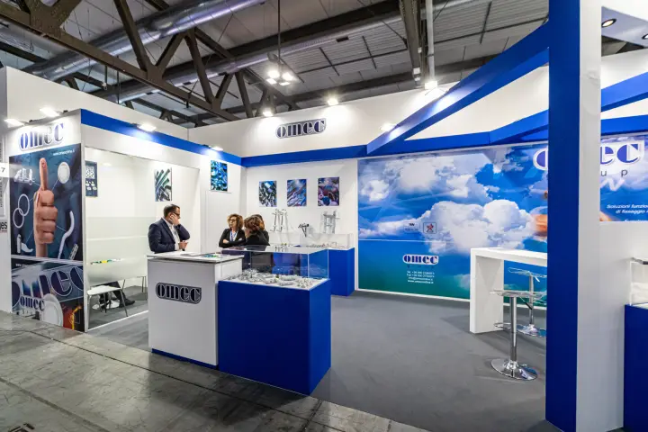 Omec stand with glass showcases of brackets and fixing components