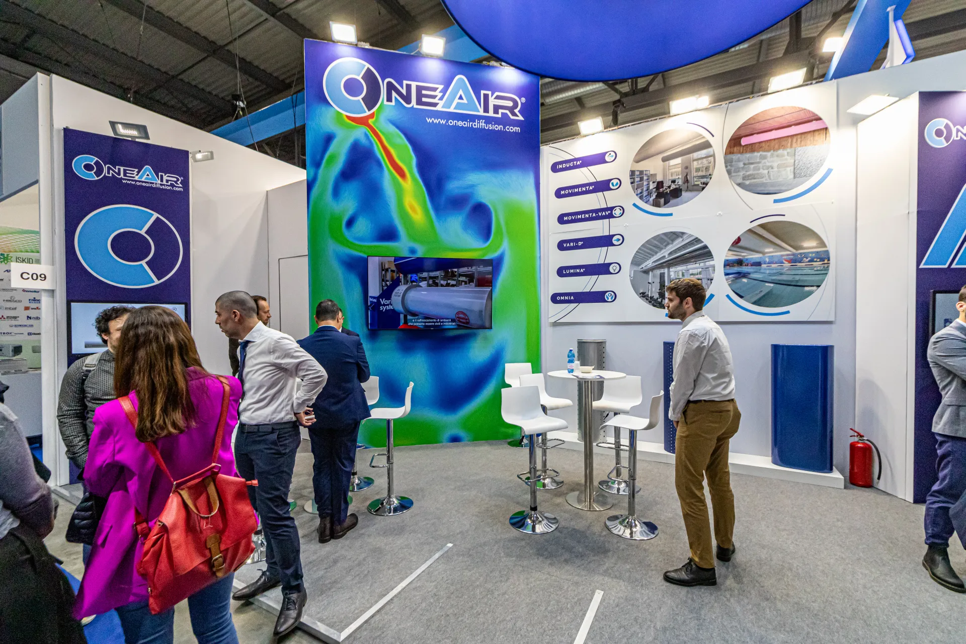 OneAir stand with airflow heat-map wall and diffuser product line names at MCE 2024