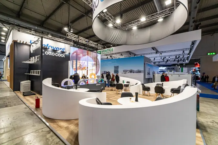 Ottocool stand with curved white counters and coils of insulated pipe at MCE 2024