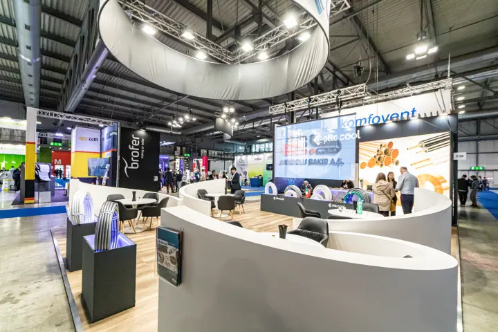 Ottocool stand with curved white walls and insulated pipe coils at MCE 2024