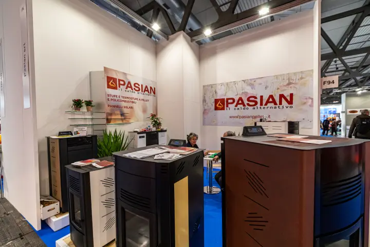 Pasian stand with pellet stoves in black, cream and brown finishes