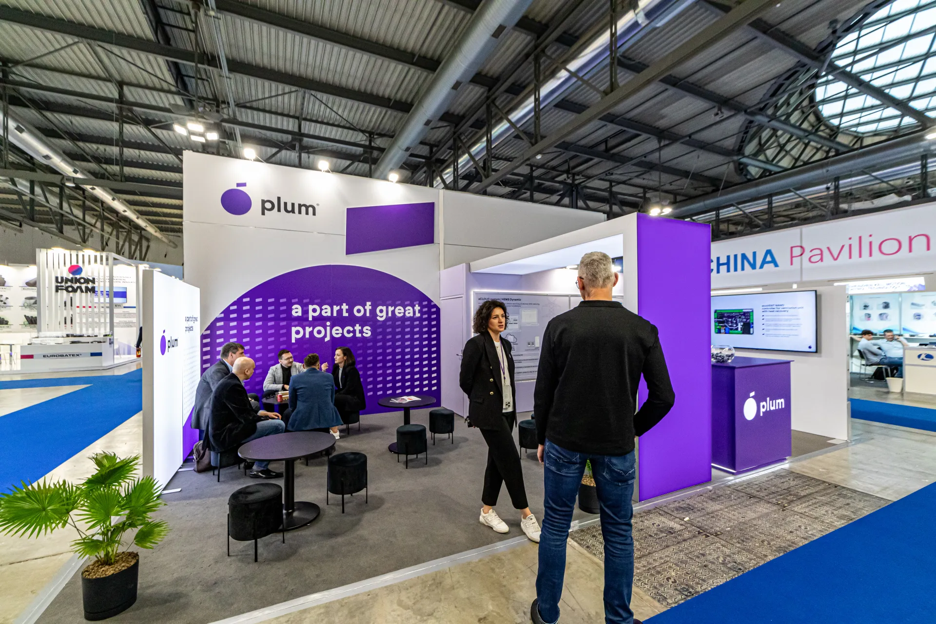 Plum stand lounge under the slogan "a part of great projects" at MCE 2024
