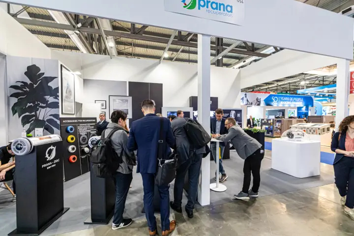 Prana recuperators stand with decentralised heat recovery units on black plinths at MCE 2024