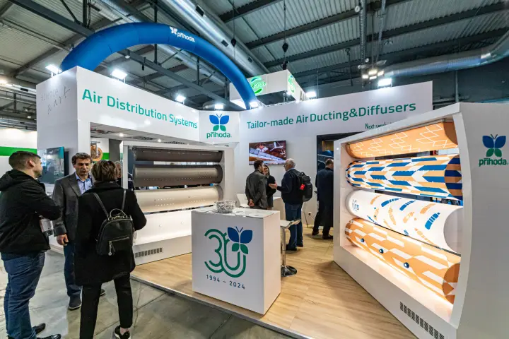 Příhoda stand with patterned textile ducts and 30th anniversary counter at MCE 2024