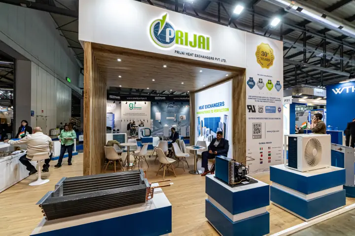 Prijai display of finned coils, condensing unit and outdoor unit on blue plinths at MCE 2024