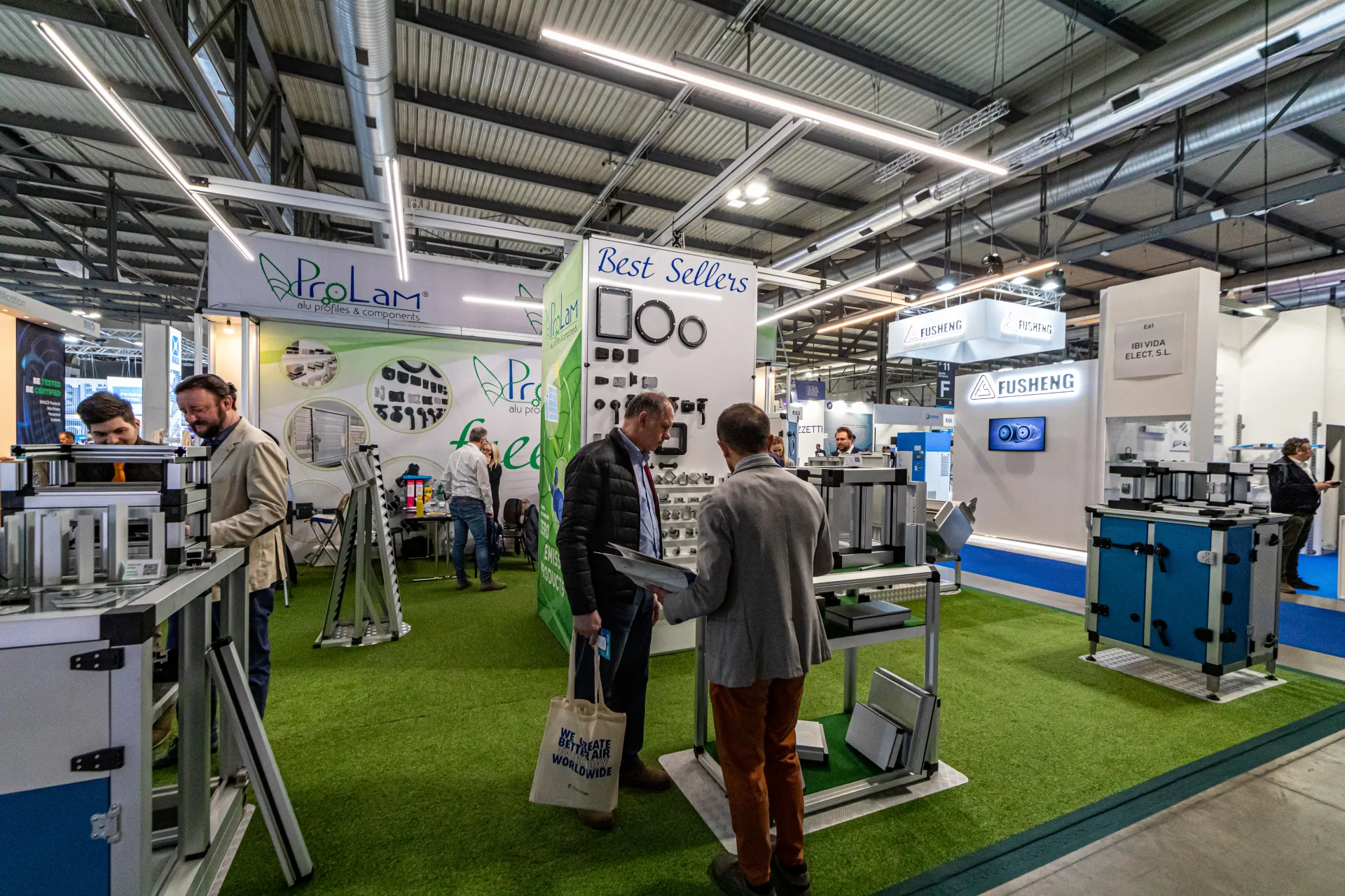 ProLam frame demonstrators with blue panels on artificial grass at MCE 2024