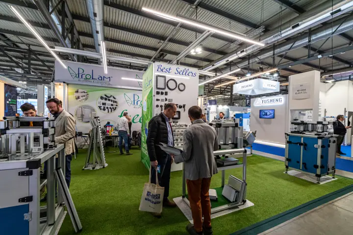 ProLam frame demonstrators with blue panels on artificial grass at MCE 2024