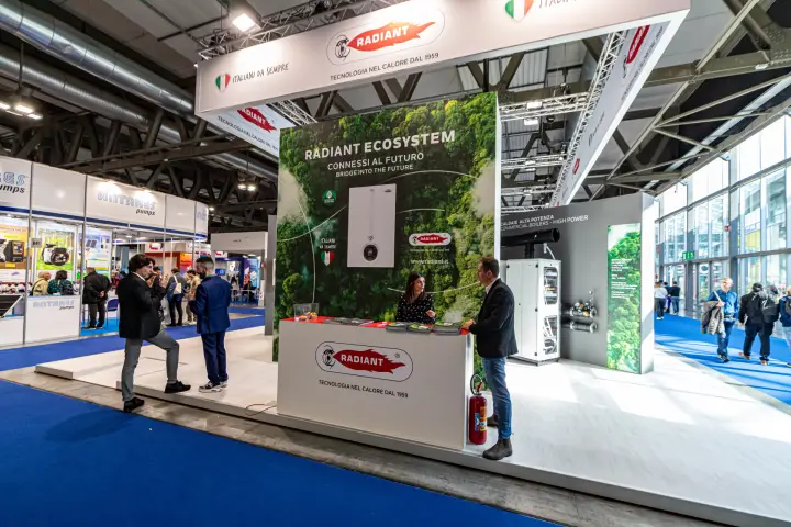 Radiant reception desk under the 'Radiant Ecosystem' forest graphic