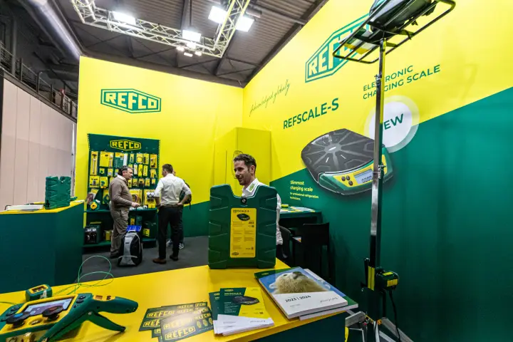 Refco Refscale-S wall graphic and catalogue on the stand counter at MCE 2024