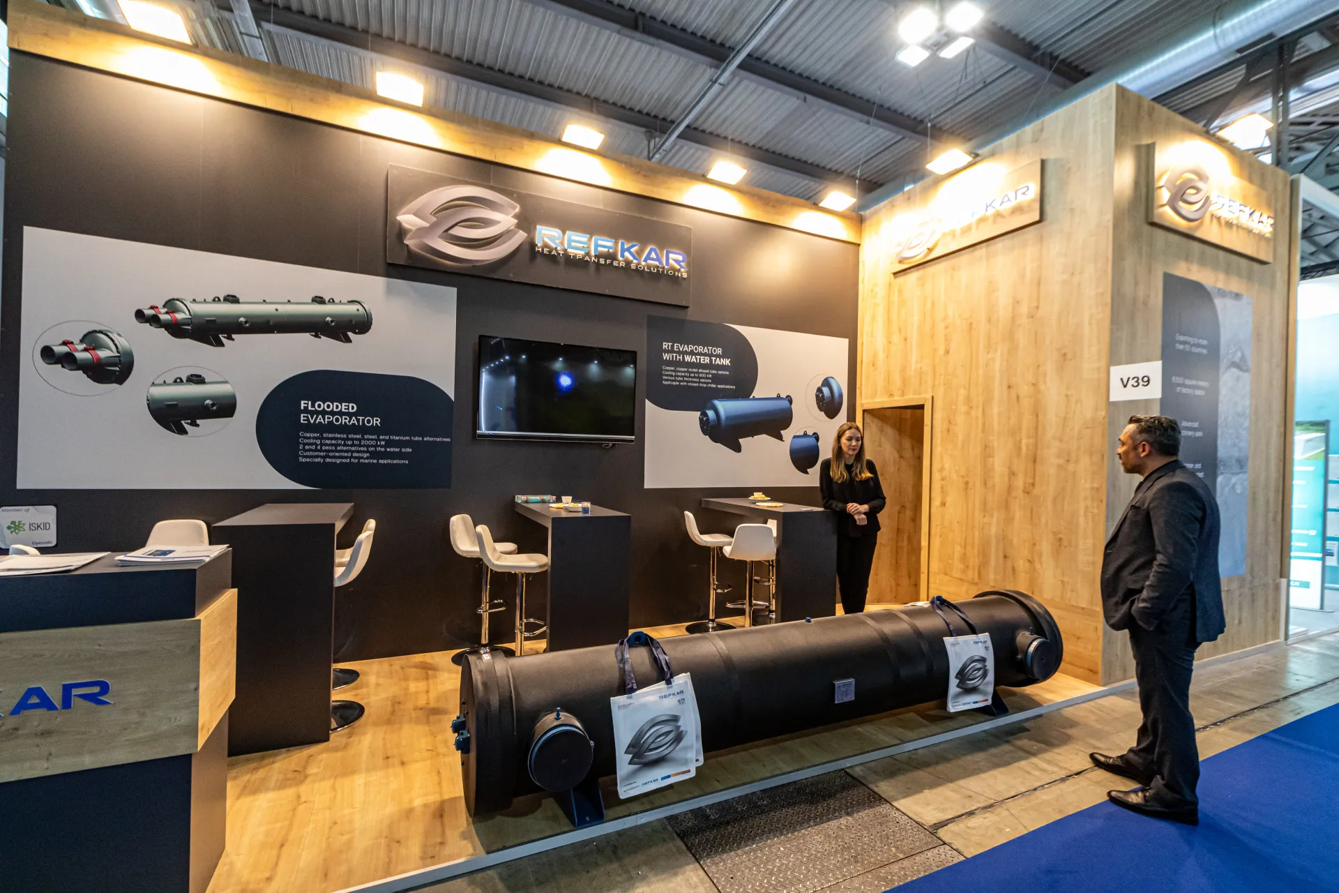 Refkar shell-and-tube heat exchanger in front of a wood-clad stand at MCE 2024