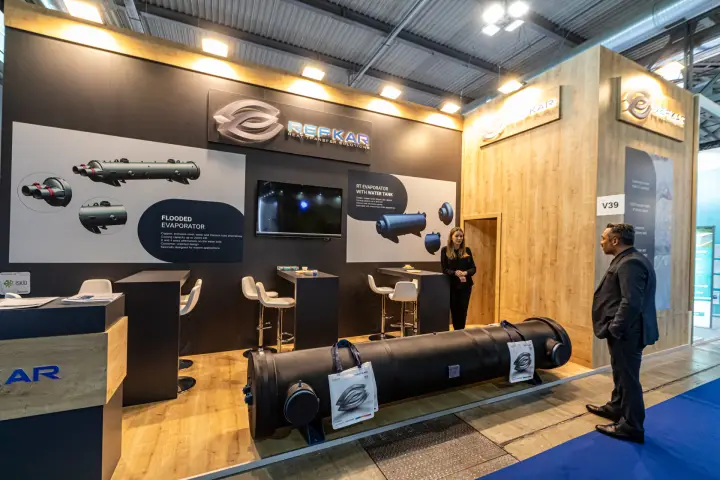 Refkar shell-and-tube heat exchanger in front of a wood-clad stand at MCE 2024