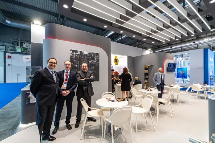 Refrigera team in the stand lounge near a showcase of valves at MCE 2024