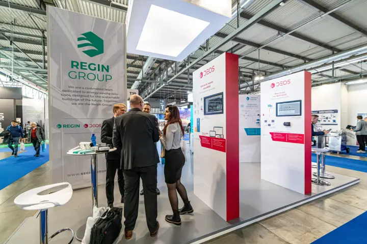 Regin Group stand with DEOS cloud-BMS and BACnet/SC display walls at MCE 2024