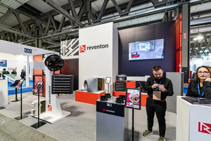 Reventon heat recovery unit and 'Steel Clamps' video on the stand screen at MCE 2024