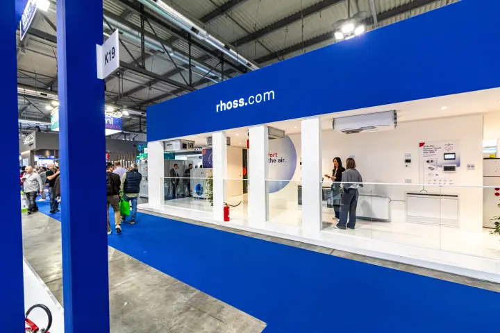 Rhoss stand front with blue rhoss.com fascia and white column gallery at MCE 2024