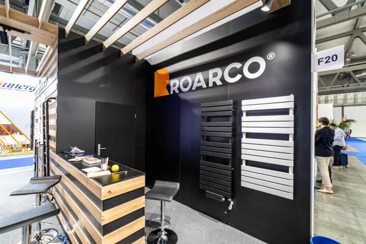 Roarco black wall with anthracite and white towel radiators
