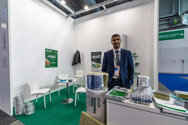 Rockal shell-scheme stand with insulation roll banner and HVAC poster at MCE 2024