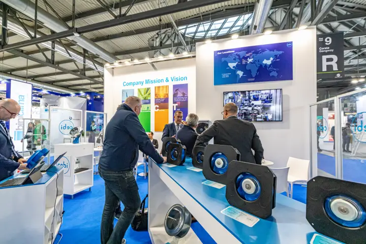 Row of square-housed fan modules with blue impellers at Cebi