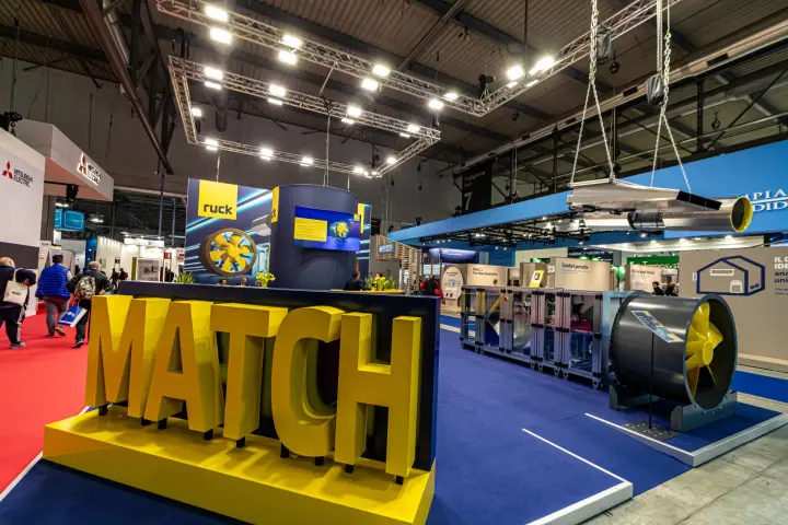 Ruck stand with giant yellow MATCH letters, axial fan and air handling units