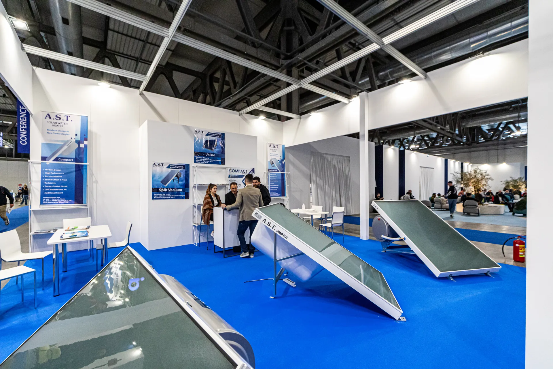A.S.T. stand with Compact solar water heaters on blue carpet at MCE 2024