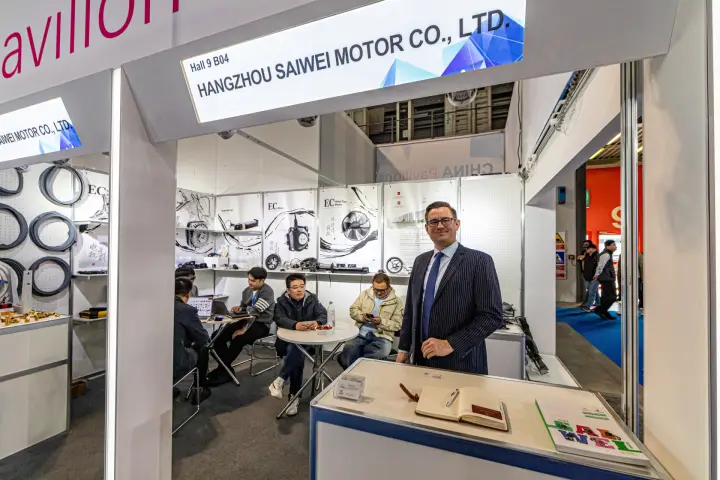 Saiwei booth in the China Pavilion with EC motor posters at MCE 2024