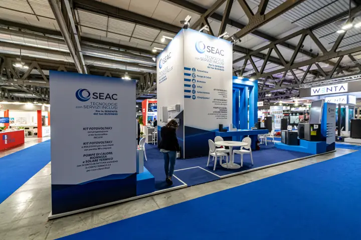SEAC stand from the aisle with photovoltaic kit and heat pump panels at MCE 2024