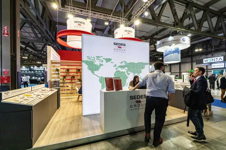 Sedes Group heating elements stand with backlit world map at MCE 2024