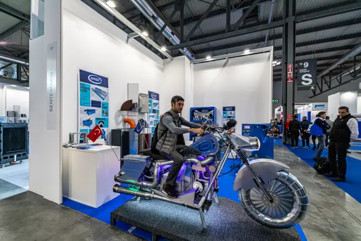 Sente Makina stand with a motorcycle built from galvanised duct parts at MCE 2024