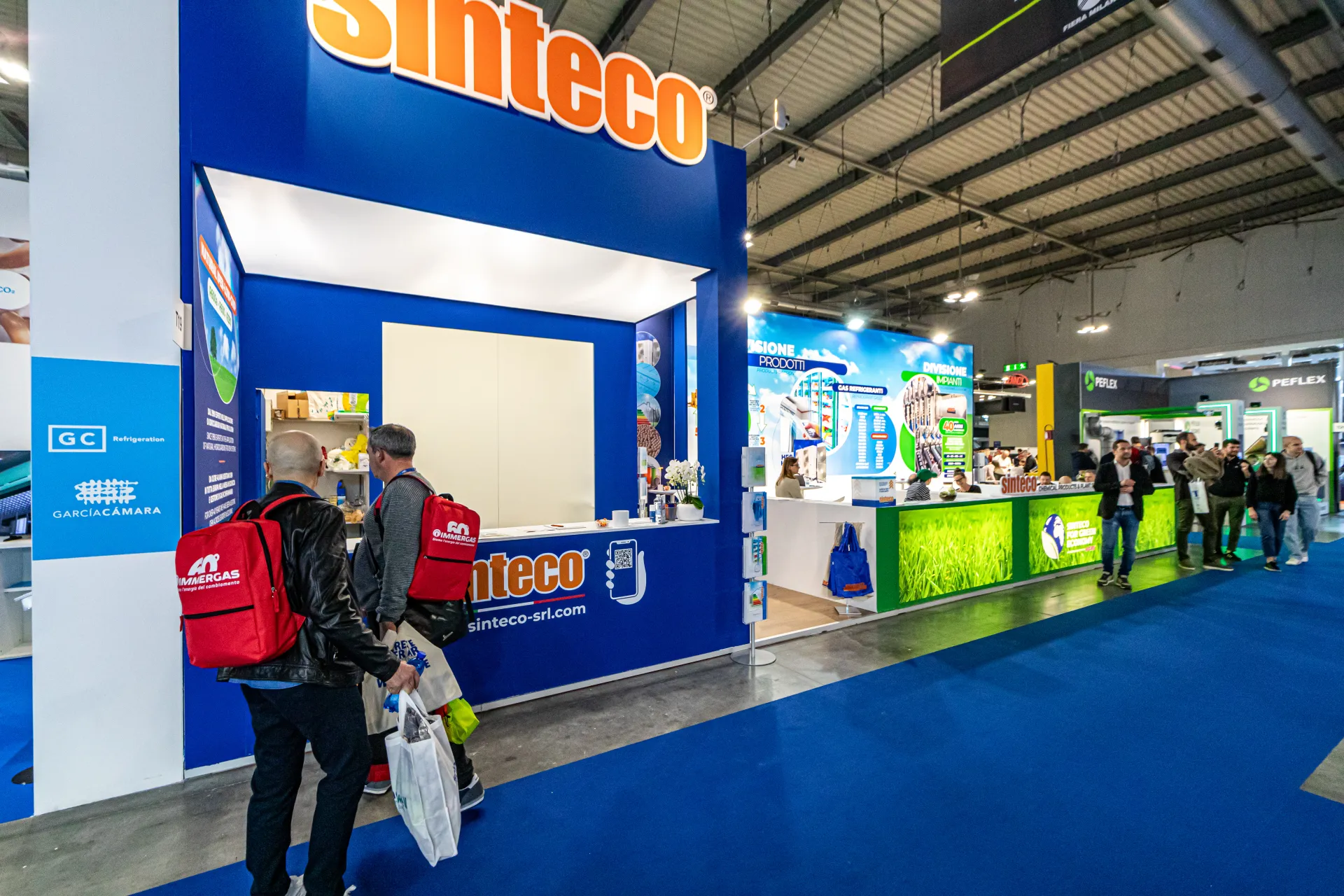 Sinteco aisle front with blue booth and green-economy counter at MCE 2024