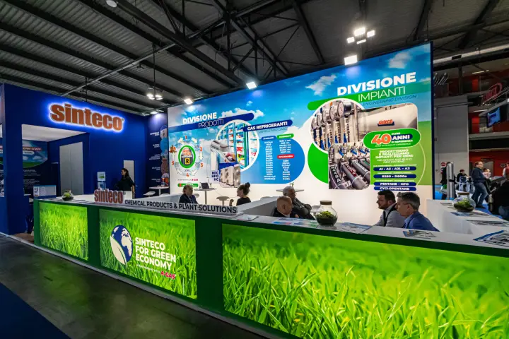 Sinteco stand with refrigerant gas and engineering division graphics