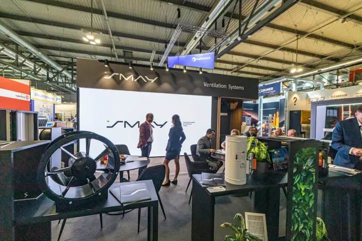Smay Ventilation Systems stand with a black jet fan and white LED wall at MCE 2024