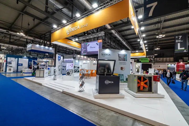 Sodeca Group stand under a large orange overhead banner in Hall 7 at MCE 2024
