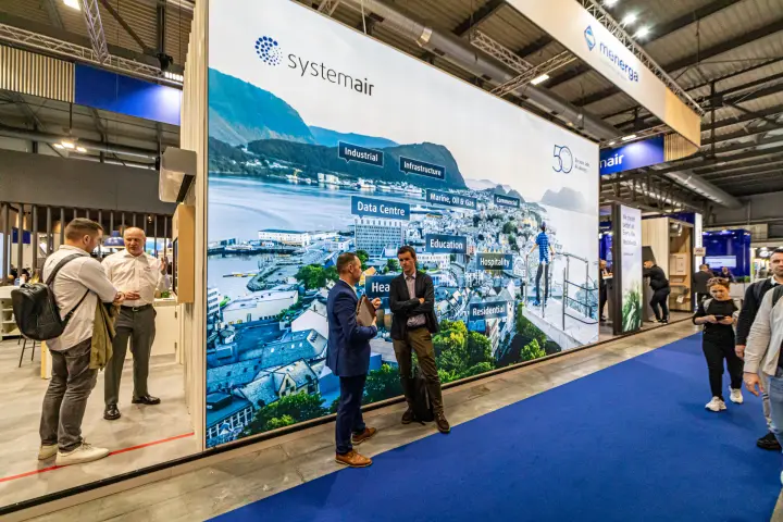 Systemair 50-year graphic wall with sector labels along the aisle at MCE 2024