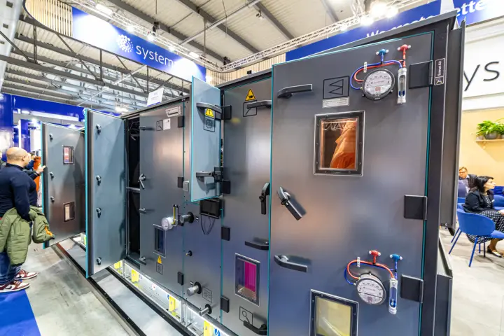 Systemair air handling unit with open access doors and pressure gauges at MCE 2024