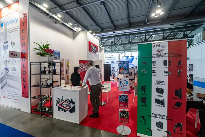 Technology Locks stand with hinge and handle displays on red carpet at MCE 2024
