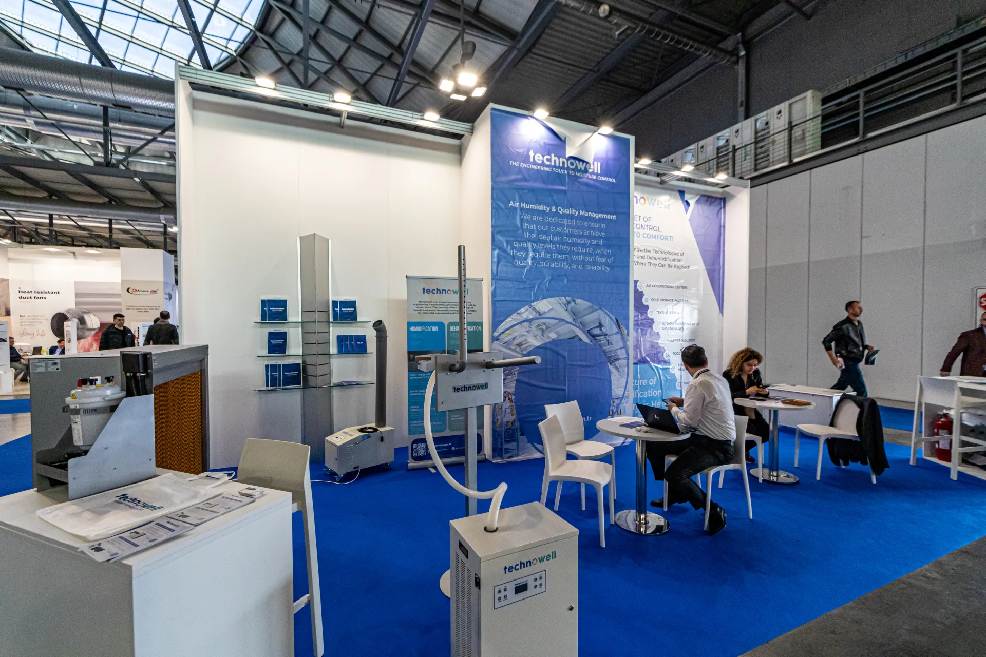 Technowell stand with humidifiers and moisture control banners at MCE 2024
