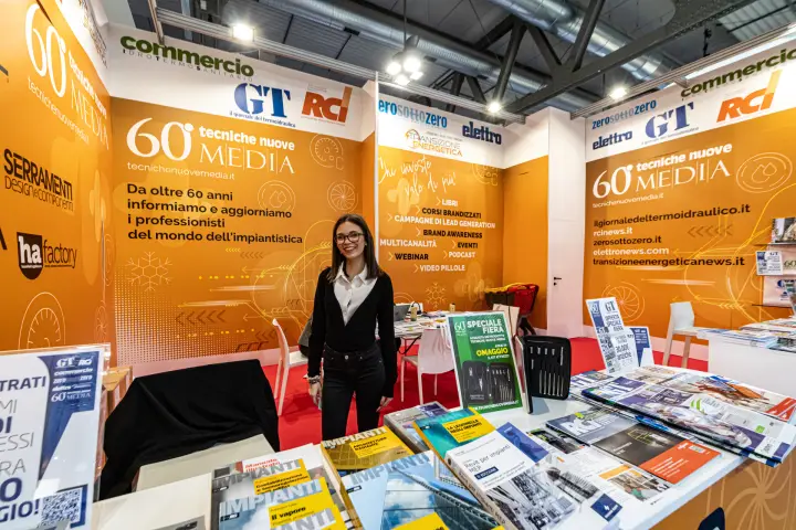 Tecniche Nuove counter with technical books on building services