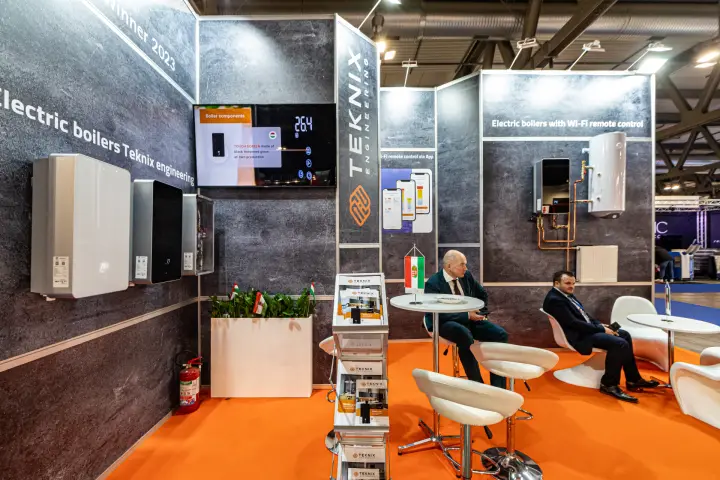Teknix stand with wall-hung electric boilers and Wi-Fi remote control demo wall