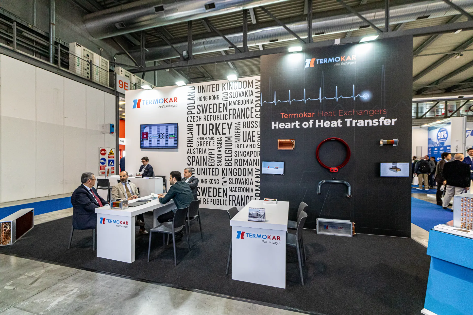 Termokar Heat Exchangers stand with 'Heart of Heat Transfer' wall and coil samples at MCE 2024