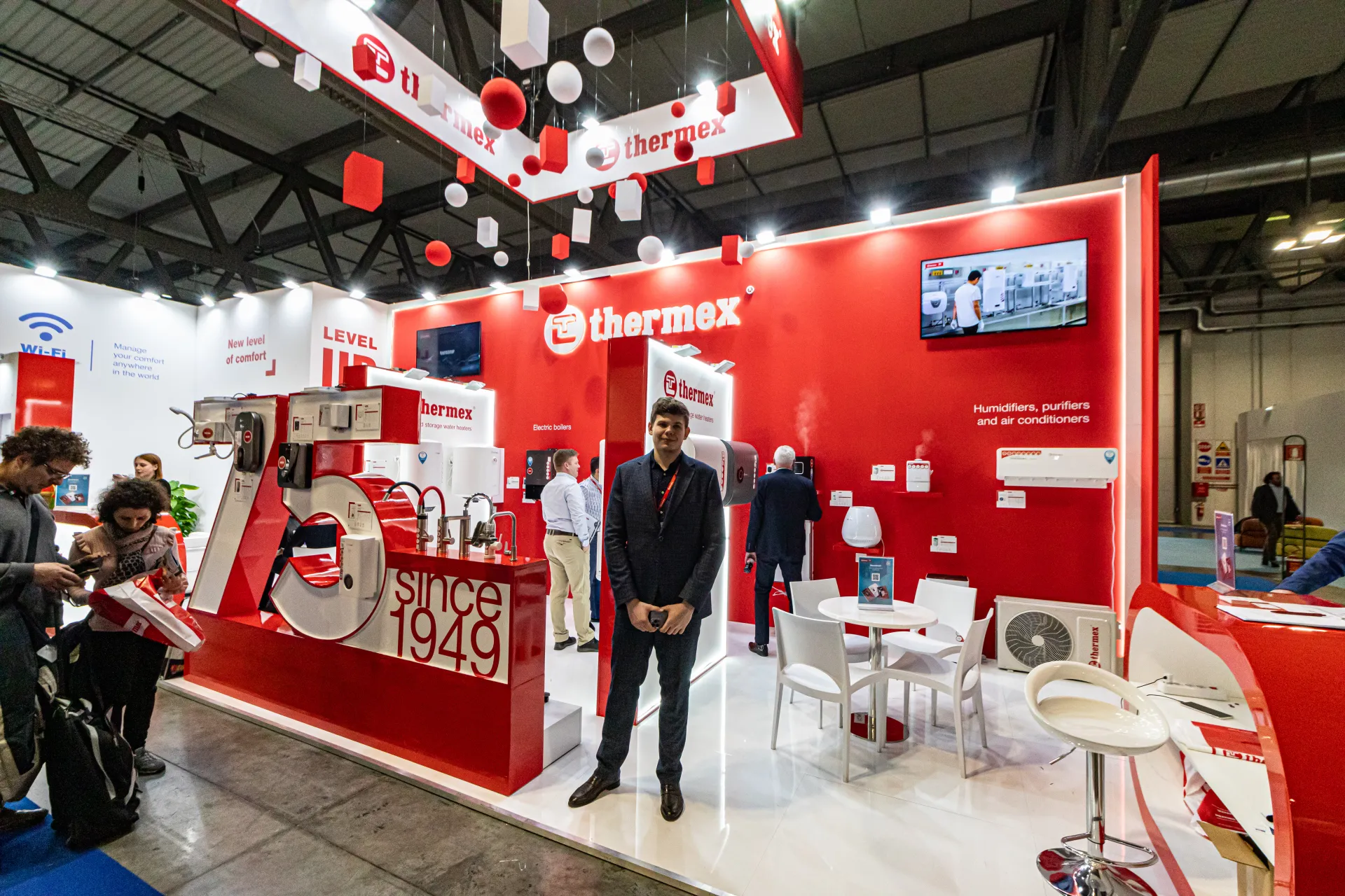 Thermex stand marking 75 years with a 'since 1949' display and hanging sign at MCE 2024