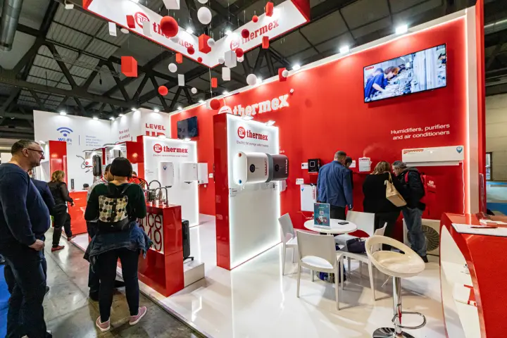 Thermex water heaters and air conditioner wall on a red stand