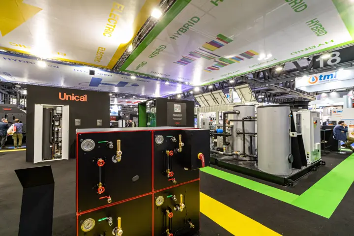 Unical hydronic modules with gauges and valves beside a tank skid at MCE 2024