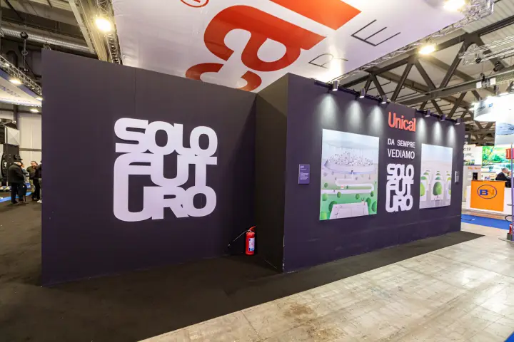 Unical stand wall with 'Solo Futuro' lettering and illustrations